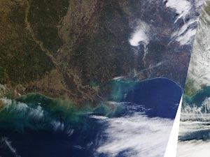 Сравнительные космоснимки участка побережья Мексиканского залива за январь 2011-го