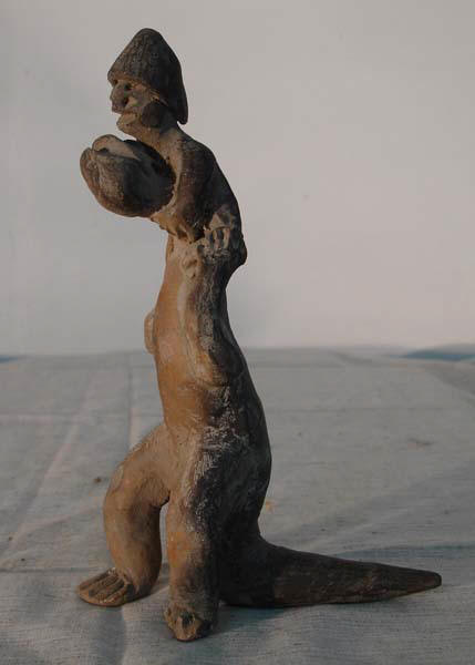 Человек верхом на динозавре (коллекция Акамбаро)